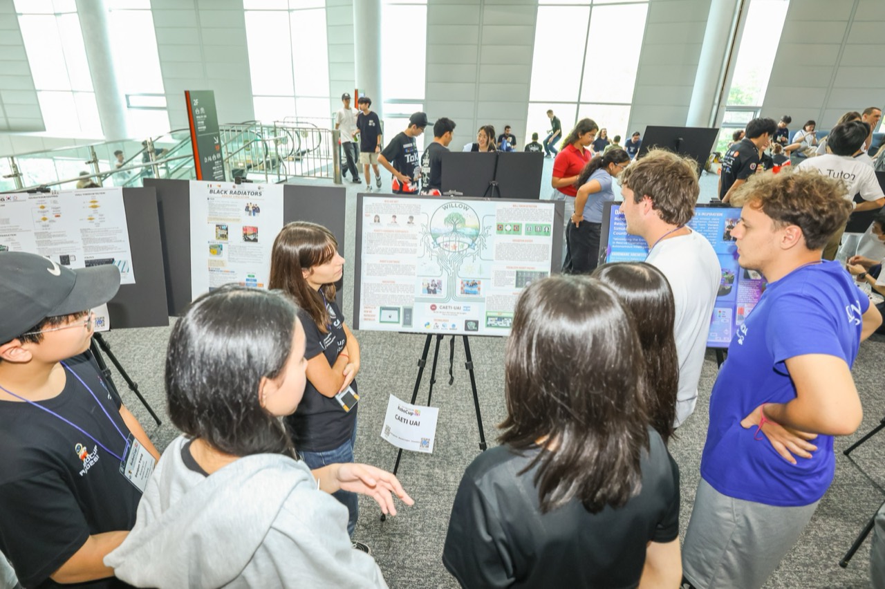 Students at a WEROB educational-robotics poster session